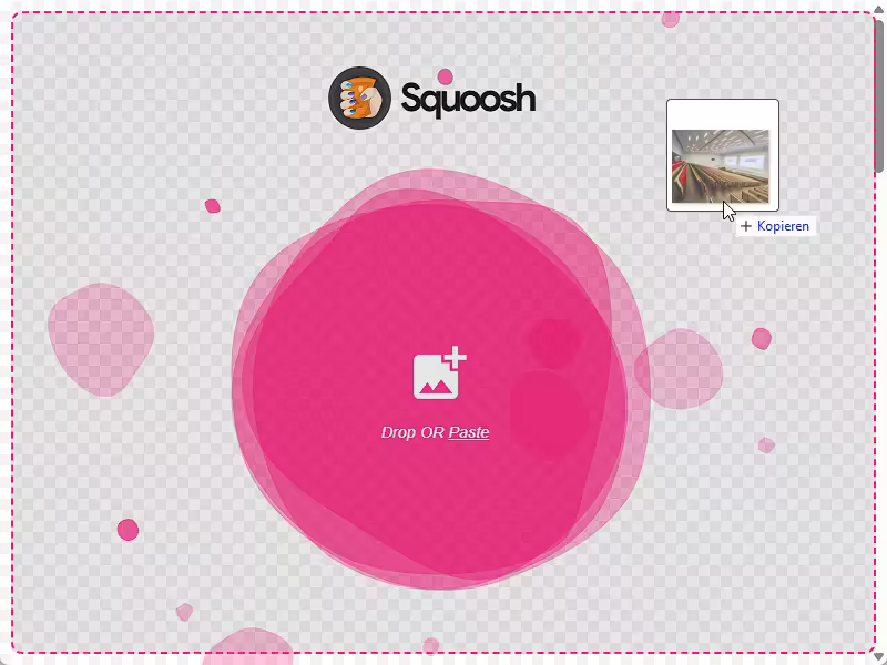 Mauszeiger zieht ein Bild per Drag-and-Drop auf die Website squoosh.app