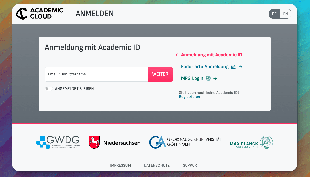 Anmeldeseite der Academic Cloud mit Login-Feld für E-Mail oder Benutzername sowie Optionen zur Anmeldung mit Academic ID, föderierter Anmeldung oder MPG-Login.